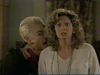 spike taunting angel by pretending to bite joyce (buffy's mom)